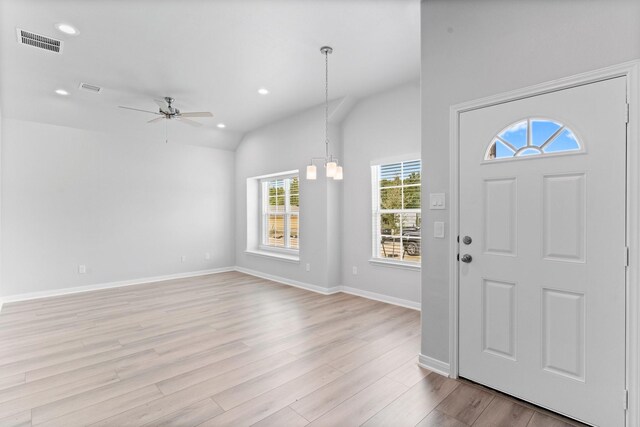 11869 E Gate Dr, Willis, TX 77318 - foyer entrance with visible vents, ceiling fan, recessed lighting, light wood-type flooring, and vaulted ceiling