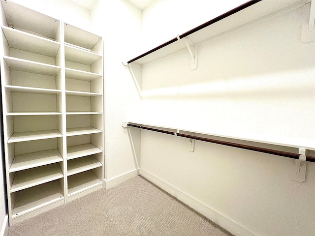 7705 Westside Villas Ln, Houston, TX 77055 - spacious closet featuring carpet