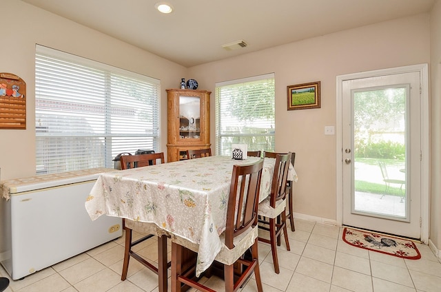 24242 Yelverton Glen Dr, Katy, TX 77493 - dining space with visible vents, recessed lighting, baseboards, and light tile patterned floors
