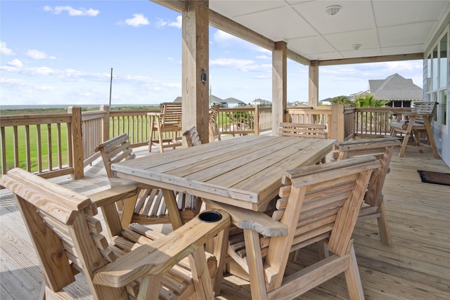 wooden deck with outdoor dining space