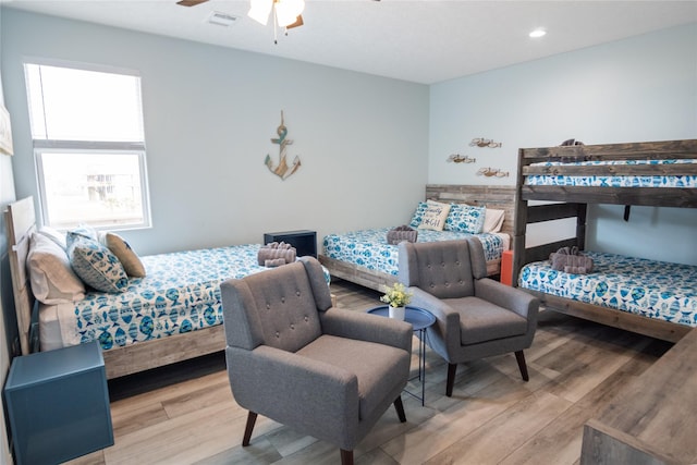 4413 Strand Ave, Port Bolivar, TX 77650 - bedroom featuring light wood-style flooring, recessed lighting, and a ceiling fan