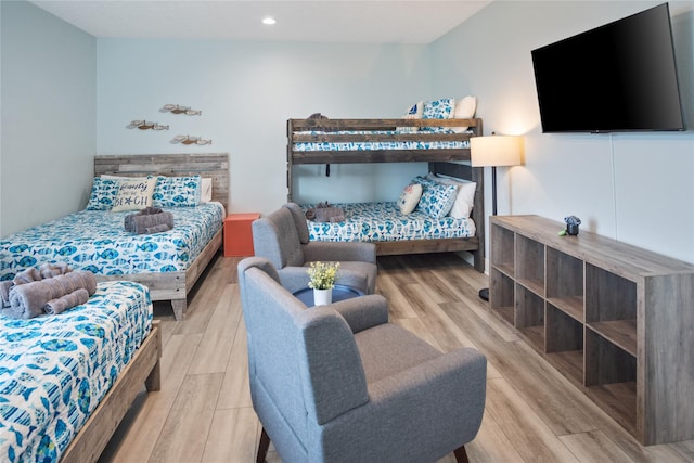 4413 Strand Ave, Port Bolivar, TX 77650 - bedroom featuring wood finished floors and recessed lighting