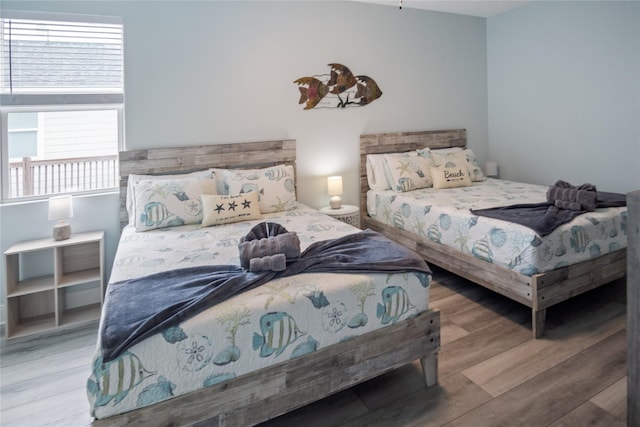 4413 Strand Ave, Port Bolivar, TX 77650 - bedroom with wood finished floors
