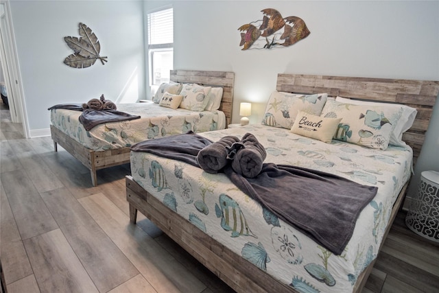 4413 Strand Ave, Port Bolivar, TX 77650 - bedroom with wood finished floors