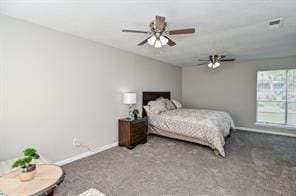 bedroom featuring carpet flooring, a ceiling fan, baseboards, and visible vents