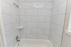 bathroom featuring bathing tub / shower combination