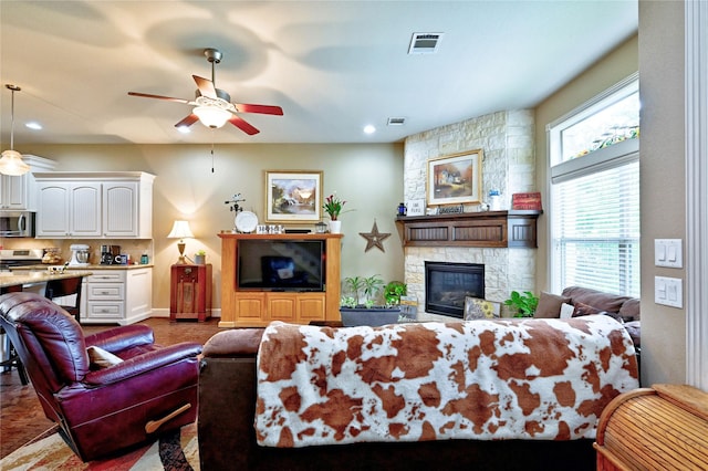 112 Timberside Dr, Conroe, TX 77304 - living area with ceiling fan, a fireplace, recessed lighting, and baseboards
