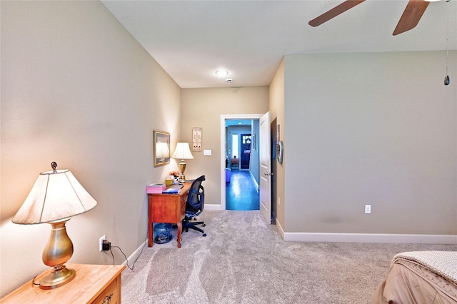 112 Timberside Dr, Conroe, TX 77304 - carpeted bedroom with baseboards, an office area, and a ceiling fan