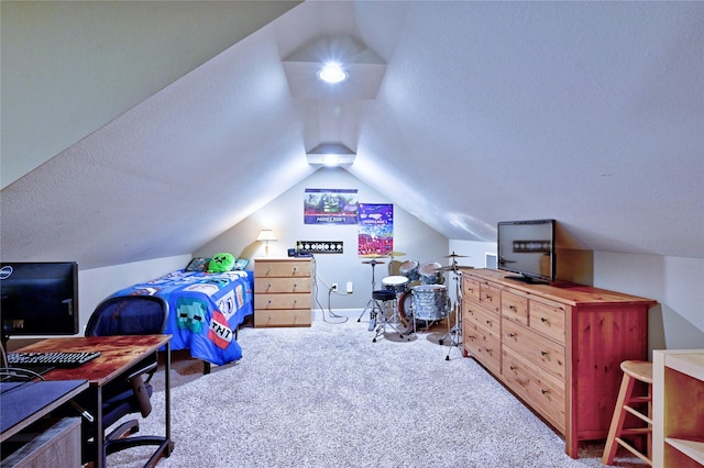 112 Timberside Dr, Conroe, TX 77304 - carpeted bedroom featuring lofted ceiling, a desk, and a textured ceiling