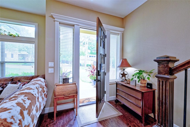 112 Timberside Dr, Conroe, TX 77304 - bedroom featuring dark wood-style flooring, access to exterior, multiple windows, and baseboards