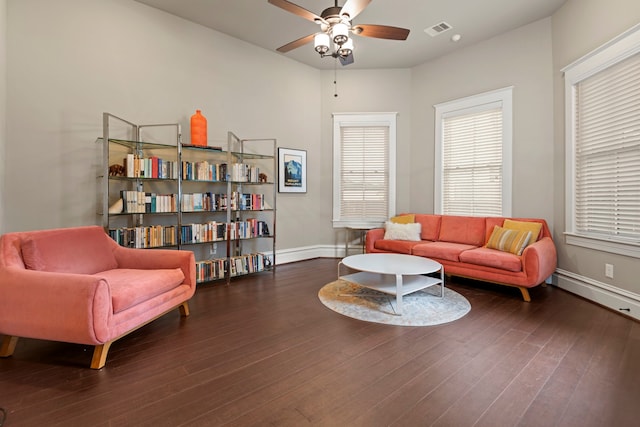 1708 Shearn St, Houston, TX 77007 - living area featuring a ceiling fan, baseboards, and wood finished floors