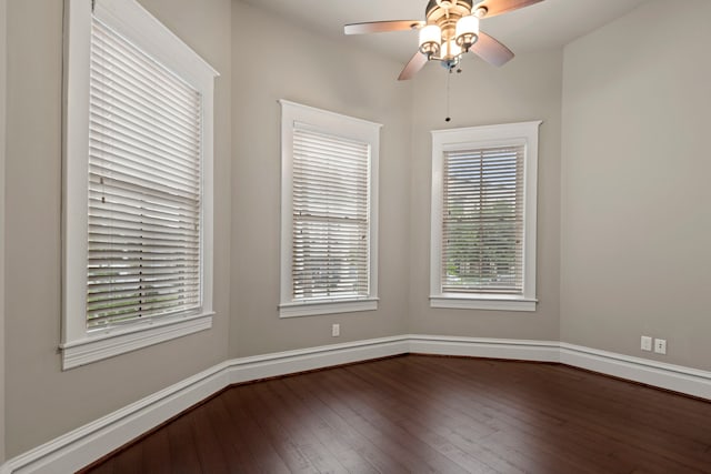 1708 Shearn St, Houston, TX 77007 - unfurnished room with dark wood finished floors, ceiling fan, and baseboards