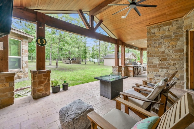 9948 Roda Dr, Conroe, TX 77303 - view of patio with ceiling fan and exterior kitchen