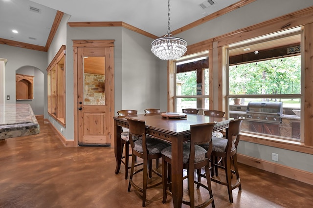 9948 Roda Dr, Conroe, TX 77303 - dining room featuring arched walkways, a chandelier, concrete floors, baseboards, and visible vents
