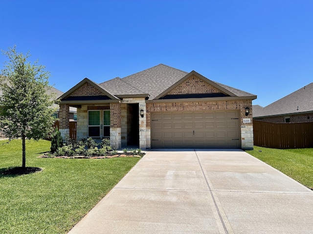 6188 White Spruce Dr, Conroe, TX 77304 - view of front facade featuring an attached garage, brick siding, driveway, and stone siding
