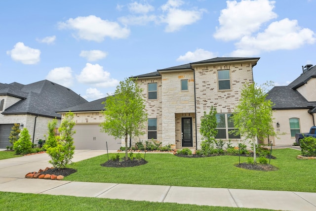 view of front of house with a garage, a front lawn, driveway, and stone siding