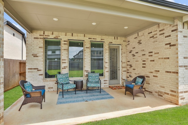 view of patio featuring fence