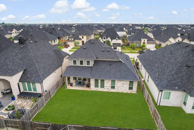 drone / aerial view featuring a residential view