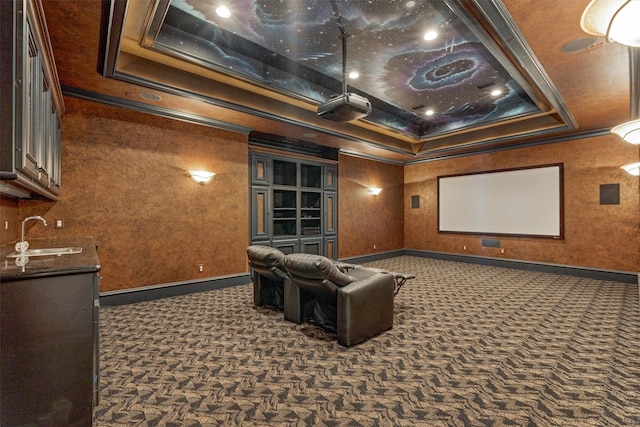 28822 Saddle Oak Dr, Montgomery, TX 77356 - home theater with crown molding, a sink, a raised ceiling, dark carpet, and baseboards