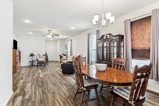 13127 Clifton Hill Ln, Houston, TX 77044 - dining room with baseboards, recessed lighting, ceiling fan with notable chandelier, and wood finished floors