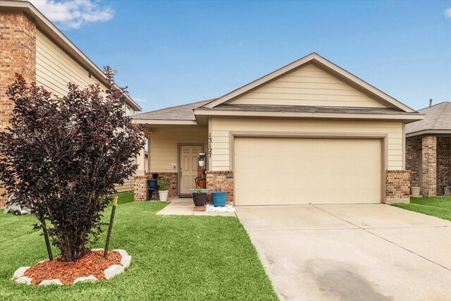 13127 Clifton Hill Ln, Houston, TX 77044 - single story home featuring brick siding, an attached garage, driveway, and a front yard