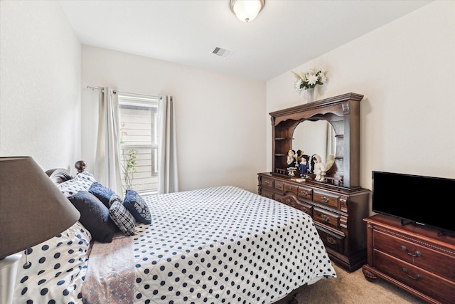 13127 Clifton Hill Ln, Houston, TX 77044 - bedroom featuring visible vents and light carpet