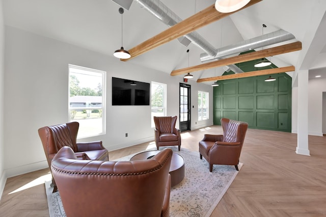 917 Houston St, Conroe, TX 77301 - living area featuring baseboards, high vaulted ceiling, and beamed ceiling