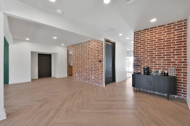 917 Houston St, Conroe, TX 77301 - living area featuring recessed lighting, baseboards, and brick wall