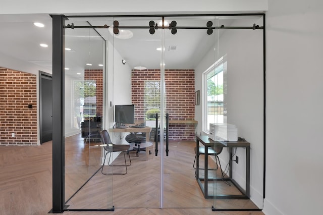 917 Houston St, Conroe, TX 77301 - home office with brick wall and visible vents