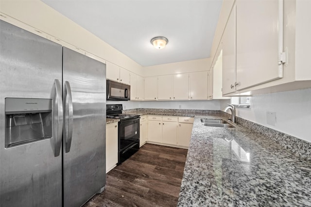 kitchen with white cabinets, light stone counters, a sink, dark wood-style floors, and black appliances