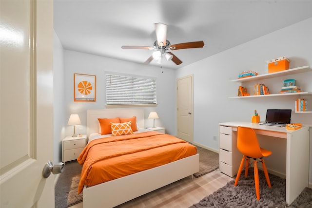 2326 20th Ave N, Texas City, TX 77590 - bedroom featuring light wood finished floors, ceiling fan, and an office area