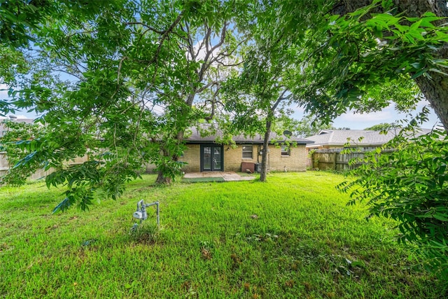 2326 20th Ave N, Texas City, TX 77590 - view of yard with french doors