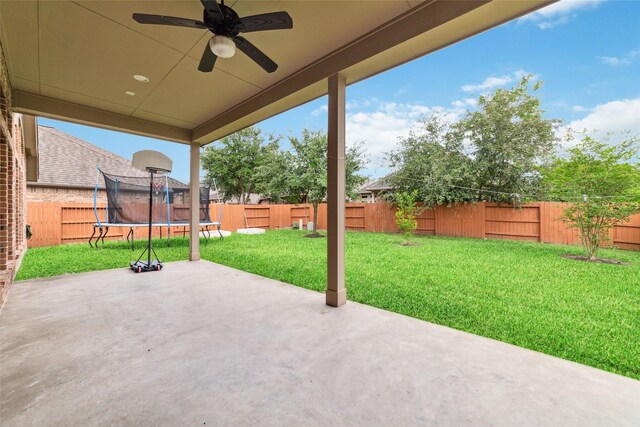 11143 Dunstan Hill Dr, Richmond, TX 77407 - view of patio with a trampoline and a ceiling fan