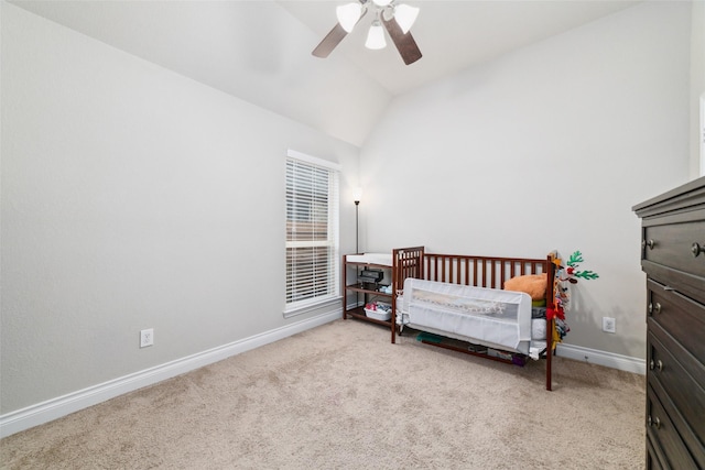 11143 Dunstan Hill Dr, Richmond, TX 77407 - bedroom featuring vaulted ceiling, light colored carpet, baseboards, and a ceiling fan
