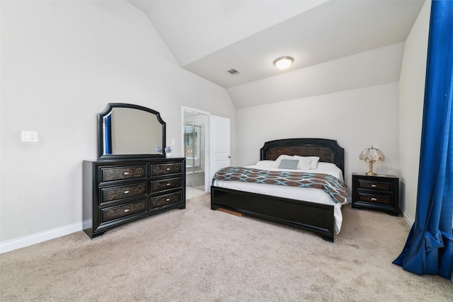 11143 Dunstan Hill Dr, Richmond, TX 77407 - carpeted bedroom featuring lofted ceiling, baseboards, and ensuite bathroom