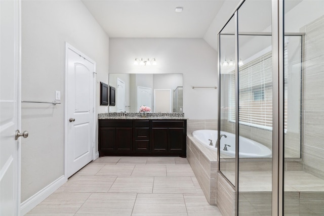 11143 Dunstan Hill Dr, Richmond, TX 77407 - bathroom with a garden tub, double vanity, lofted ceiling, tile patterned flooring, and a tile shower
