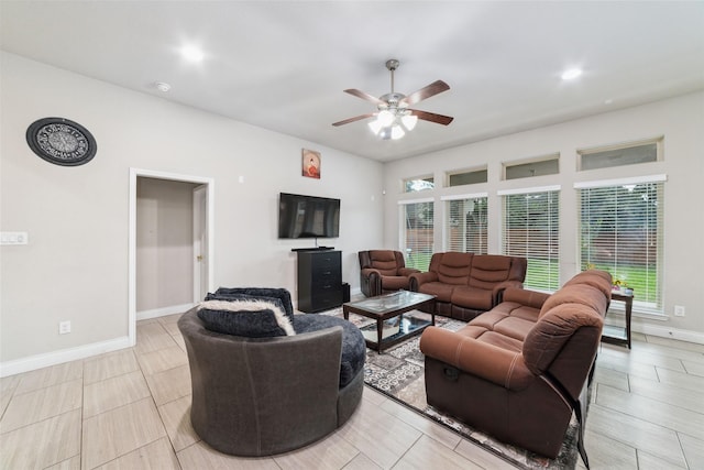 11143 Dunstan Hill Dr, Richmond, TX 77407 - living room with ceiling fan and baseboards