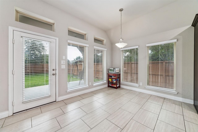 11143 Dunstan Hill Dr, Richmond, TX 77407 - dining area with baseboards and vaulted ceiling