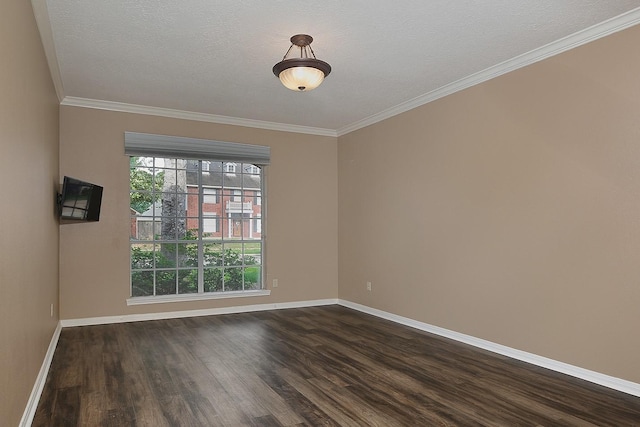 unfurnished room featuring crown molding, baseboards, and dark wood-type flooring