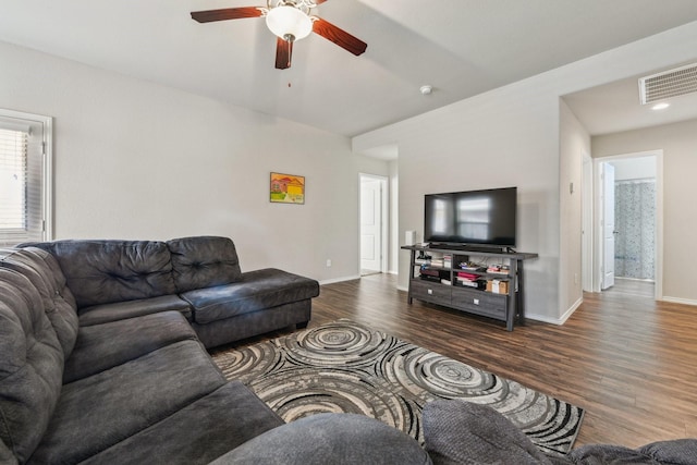 6011 Diantha St, Katy, TX 77449 - living area featuring a ceiling fan, wood finished floors, and baseboards