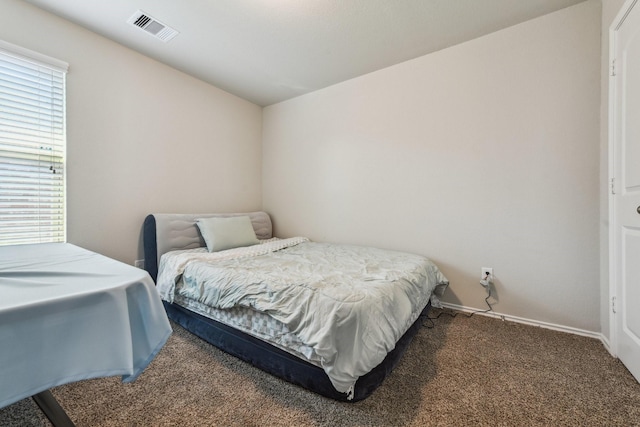 6011 Diantha St, Katy, TX 77449 - carpeted bedroom featuring baseboards and lofted ceiling
