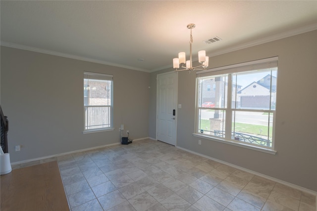 unfurnished dining area with visible vents, baseboards, crown molding, and an inviting chandelier