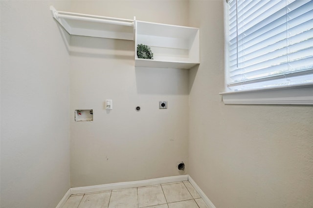 7315 Palestine St, Houston, TX 77020 - washroom featuring hookup for an electric dryer, washer hookup, and baseboards