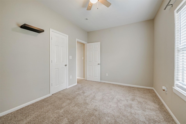 7315 Palestine St, Houston, TX 77020 - unfurnished bedroom featuring carpet flooring, baseboards, and ceiling fan
