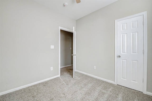 7315 Palestine St, Houston, TX 77020 - unfurnished bedroom featuring carpet floors, baseboards, and ceiling fan