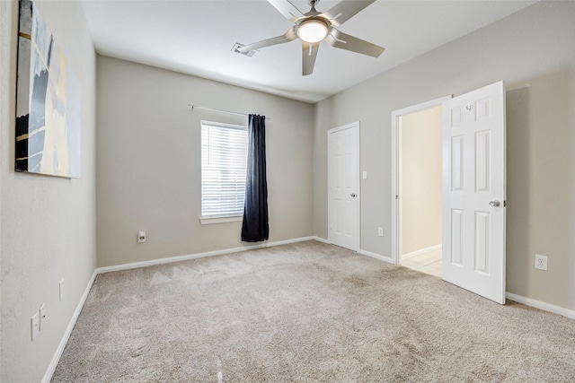 7315 Palestine St, Houston, TX 77020 - unfurnished bedroom featuring carpet flooring, ceiling fan, and baseboards