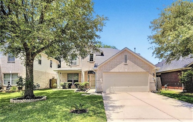 5310 Flagridge Ln, Houston, TX 77066 - view of front of house with a garage, a front lawn, driveway, and brick siding