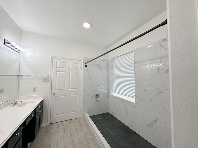 5310 Flagridge Ln, Houston, TX 77066 - full bathroom featuring a marble finish shower, vanity, and wood finished floors