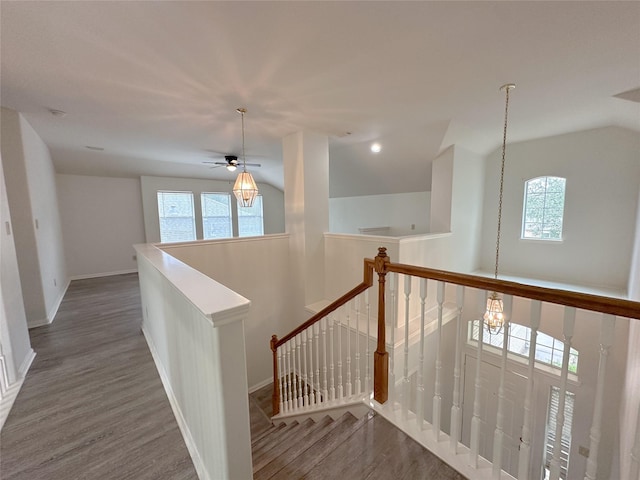 5310 Flagridge Ln, Houston, TX 77066 - hall featuring an upstairs landing, healthy amount of natural light, lofted ceiling, and wood finished floors