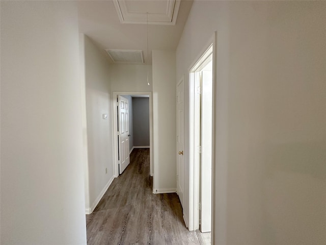 5310 Flagridge Ln, Houston, TX 77066 - corridor featuring attic access, light wood-type flooring, and baseboards